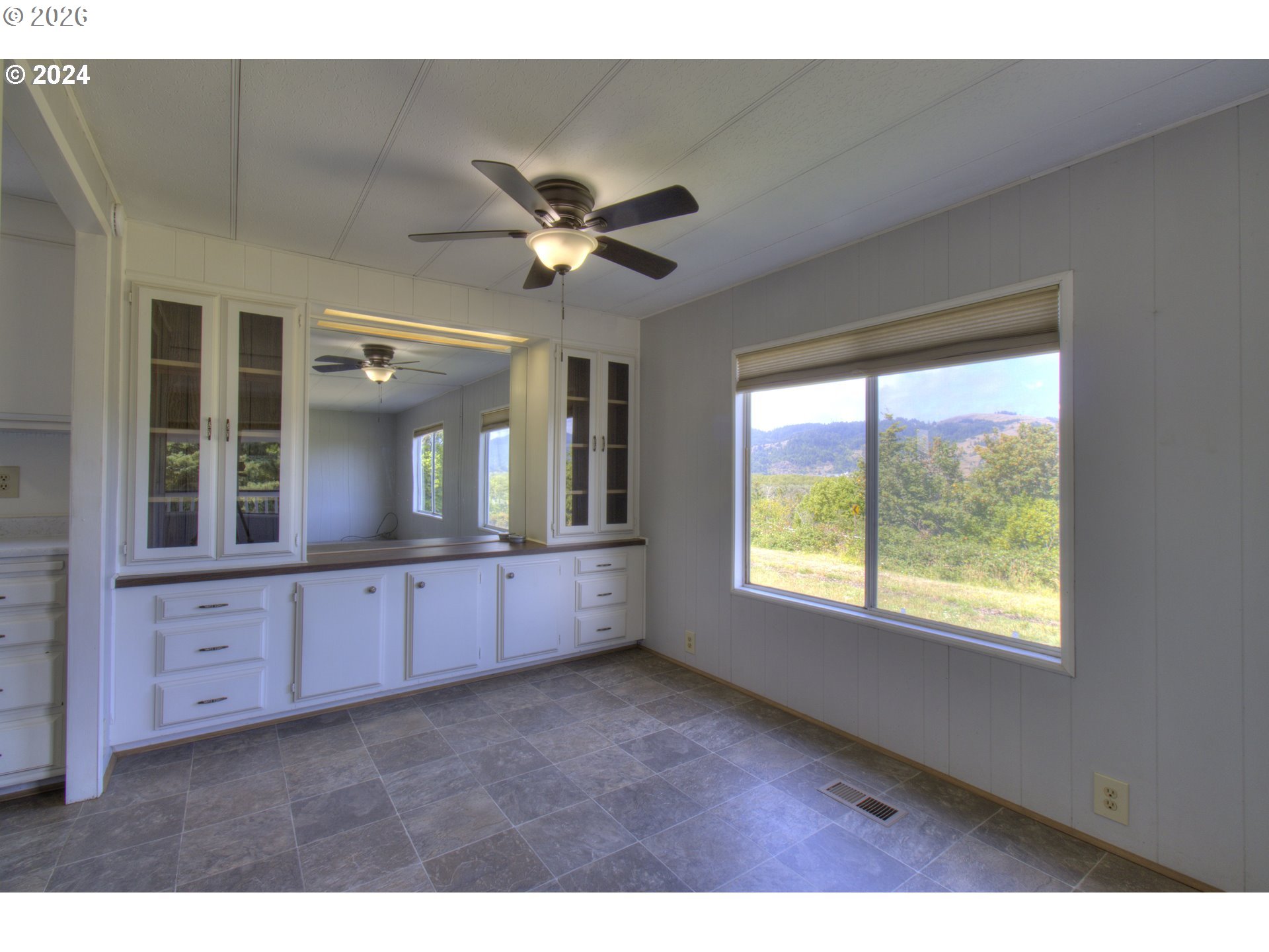 95171 Vista Loop Gold Beach, OR 97444 - Photo 8 of 35 a living room with granite countertop furniture and a large window