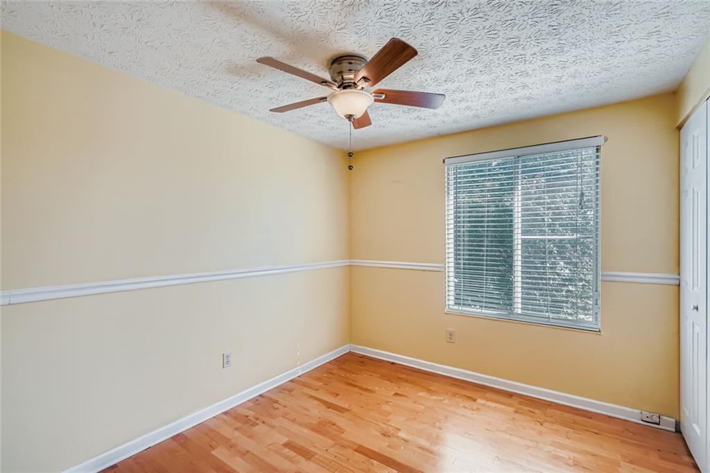 6134 Raintree Bend Lithonia, GA 30058 - Photo 12 of 17 a view of an empty room with a window