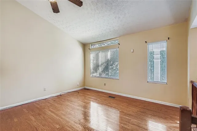 an empty room with windows