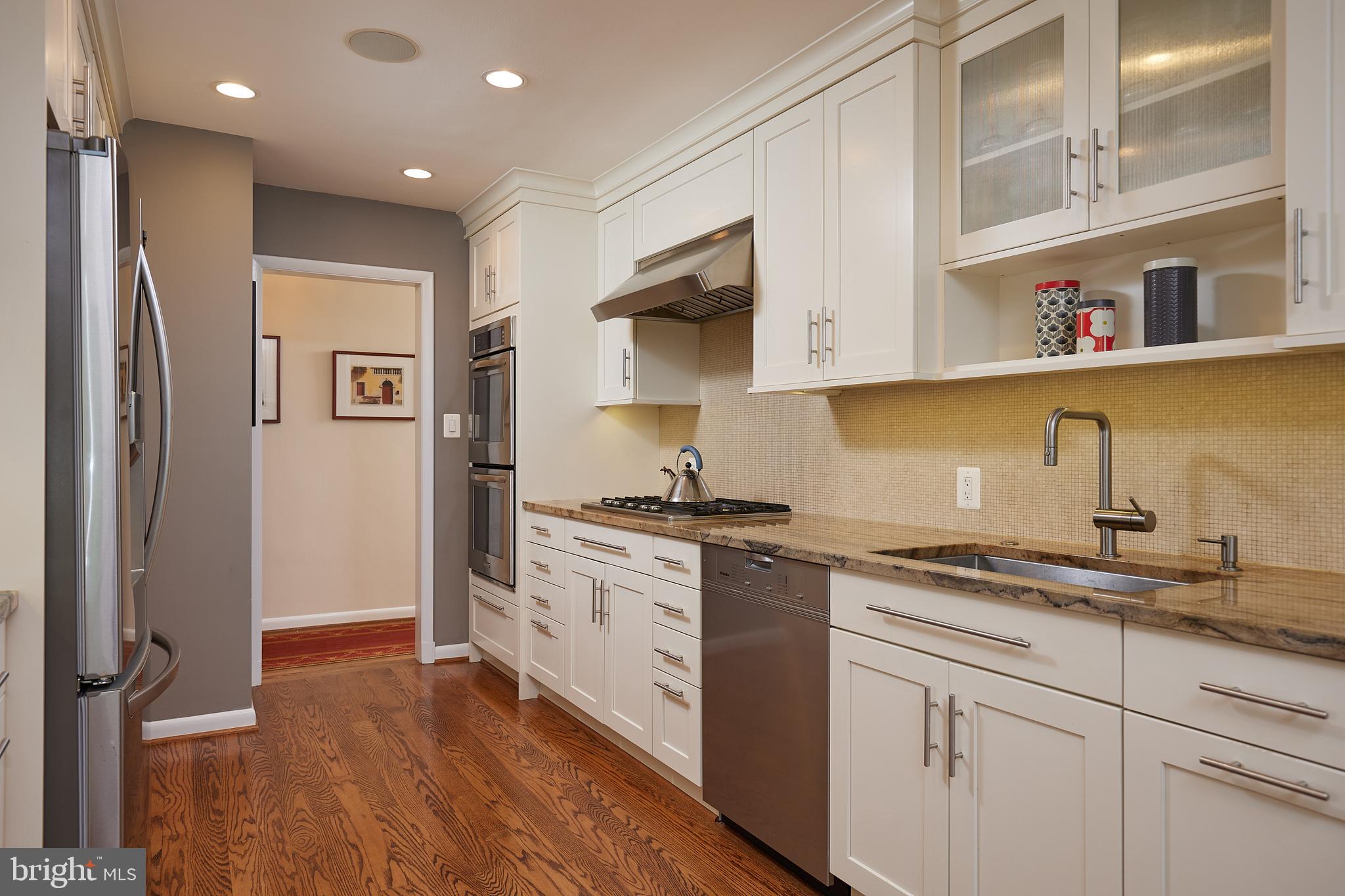 9813 Old Spring Road Kensington, MD 20895 - Photo 14 of 35 Remodeled kitchen w/ hardwood floors