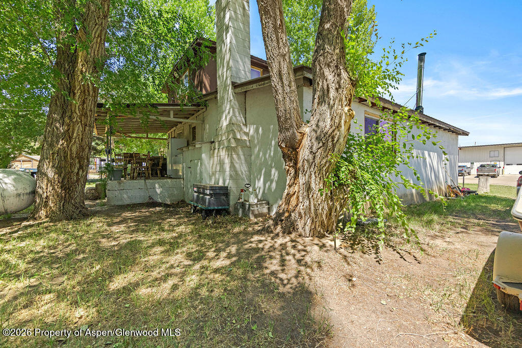 36 Collom Street Maybell, CO 81640 - Photo 13 of 43 front view of a house with a yard