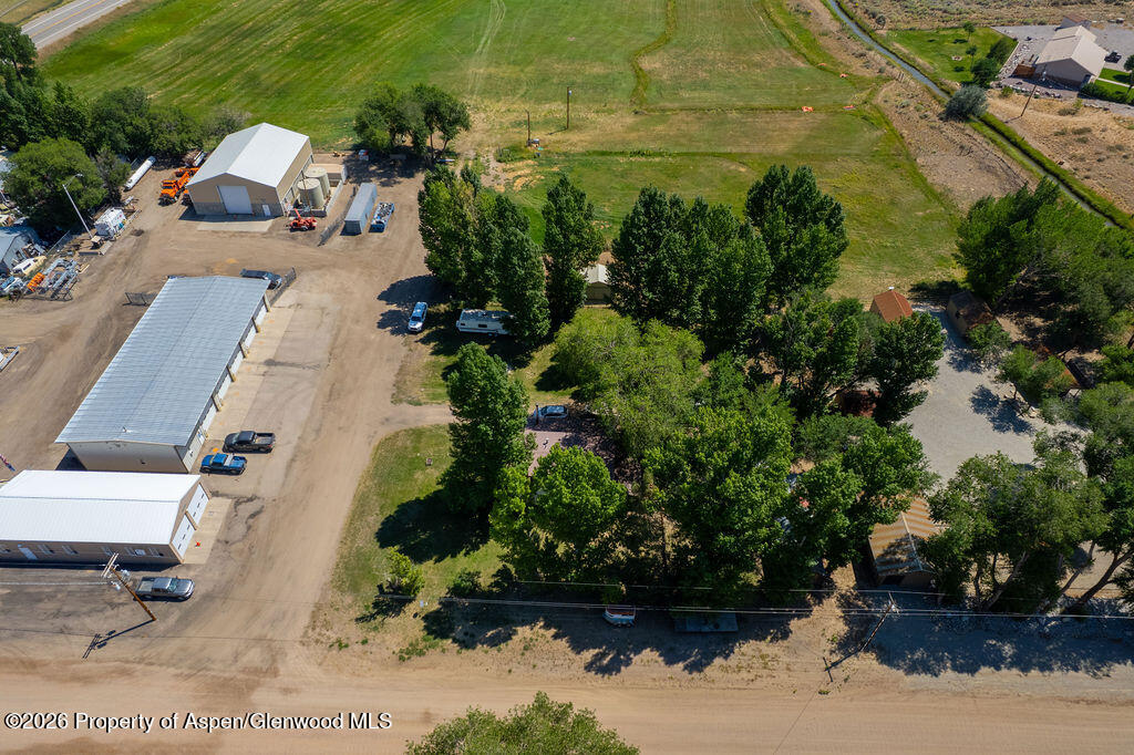 36 Collom Street Maybell, CO 81640 - Photo 14 of 43 an aerial view of a house with a yard
