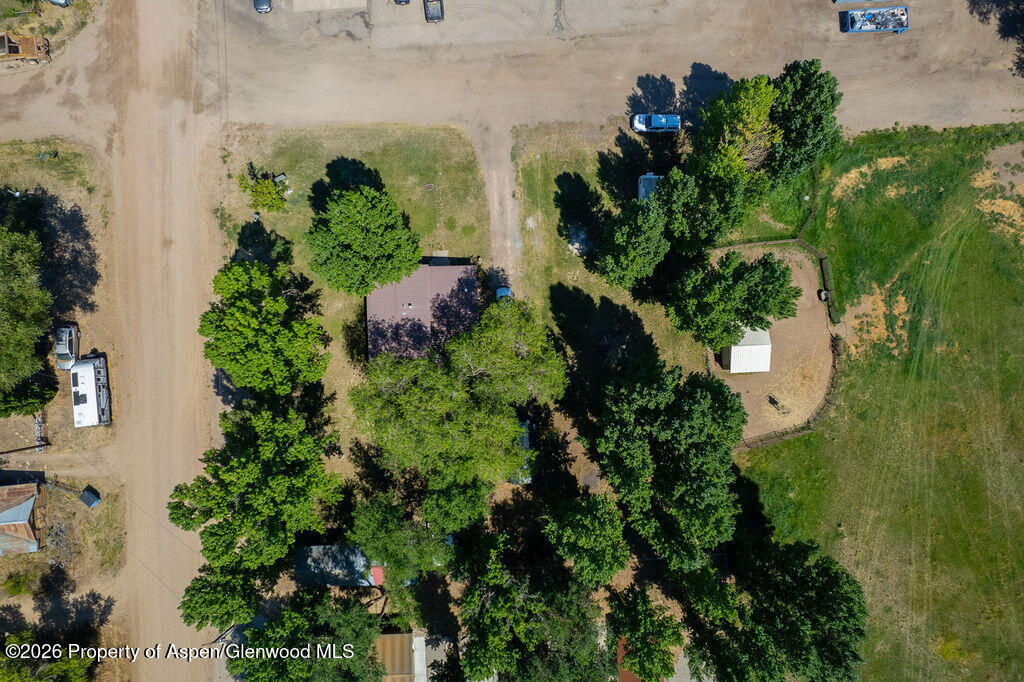 36 Collom Street Maybell, CO 81640 - Photo 15 of 43 an aerial view of a house with a yard