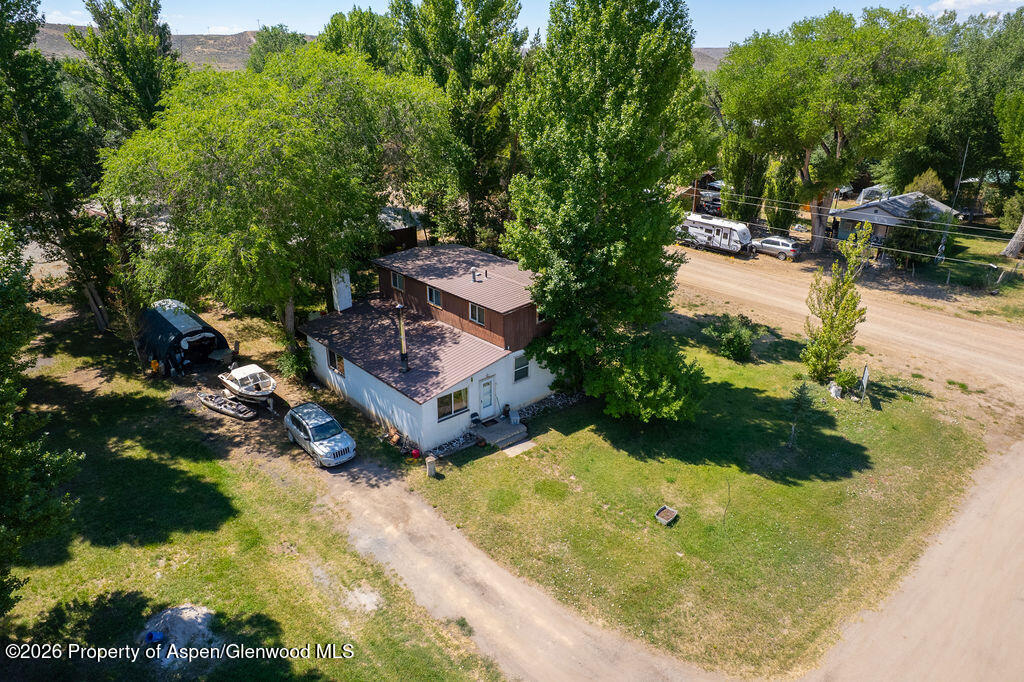 36 Collom Street Maybell, CO 81640 - Photo 5 of 43 a view of a backyard with swimming pool