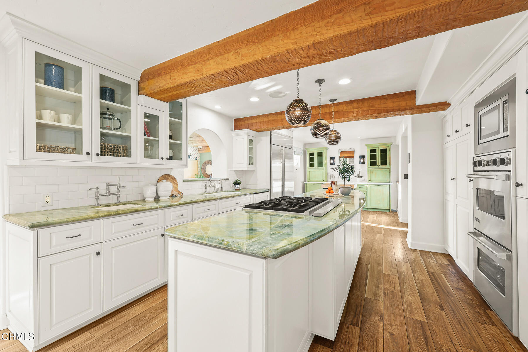 431 Prospect Circle South Pasadena, CA 91030 - Photo 4 of 20 a kitchen with stainless steel appliances granite countertop a sink and wooden cabinets