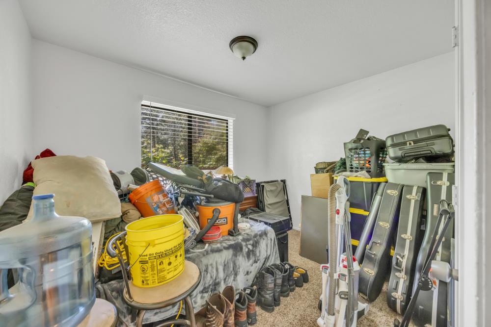 2960 Backpack Trail Pollock Pines, CA 95726 - Photo 14 of 49 a view of a livingroom with furniture hardwood floor and a ceiling fan