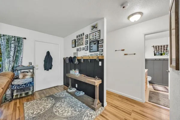 a bedroom with furniture and a window