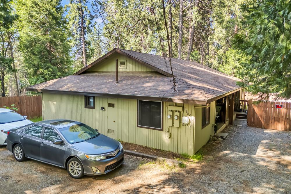 2960 Backpack Trail Pollock Pines, CA 95726 - Photo 42 of 49 a front view of a house with a yard