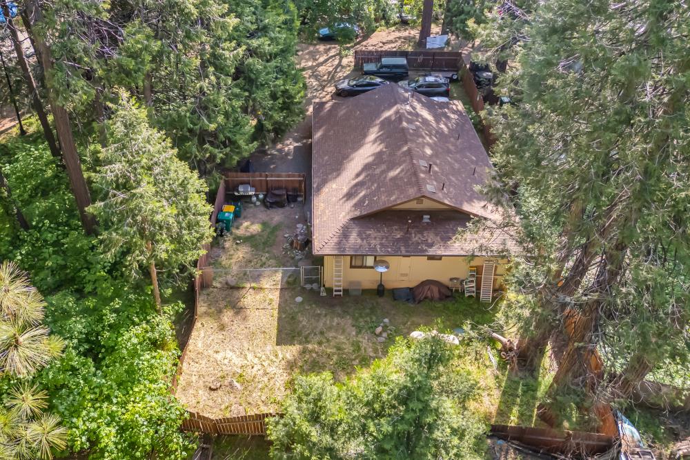 2960 Backpack Trail Pollock Pines, CA 95726 - Photo 46 of 49 a view of a house with a yard