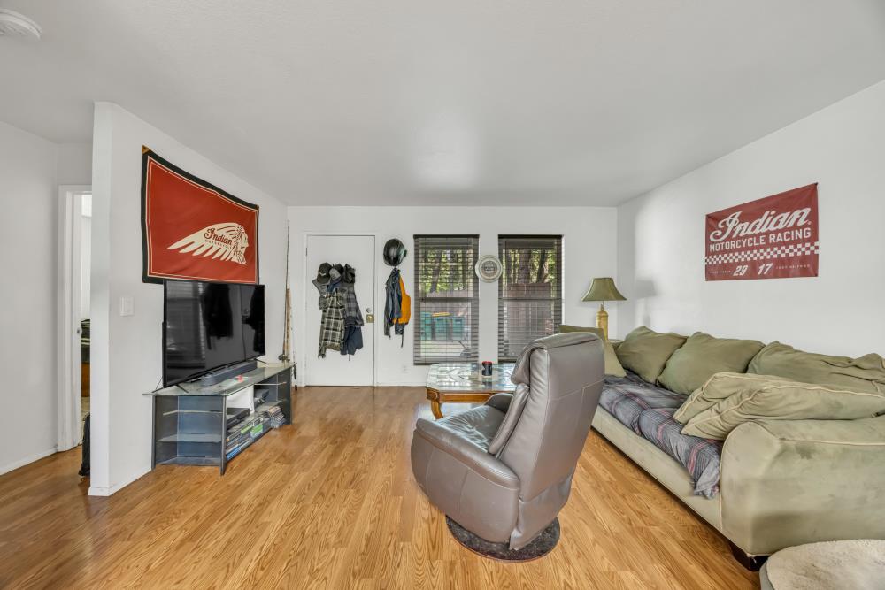 2960 Backpack Trail Pollock Pines, CA 95726 - Photo 6 of 49 a living room with furniture and a flat screen tv