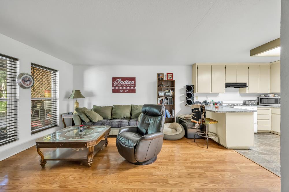 2960 Backpack Trail Pollock Pines, CA 95726 - Photo 8 of 49 a living room with furniture and kitchen view