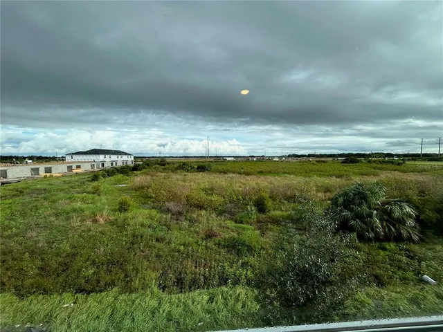 a view of a large window with an outdoor view