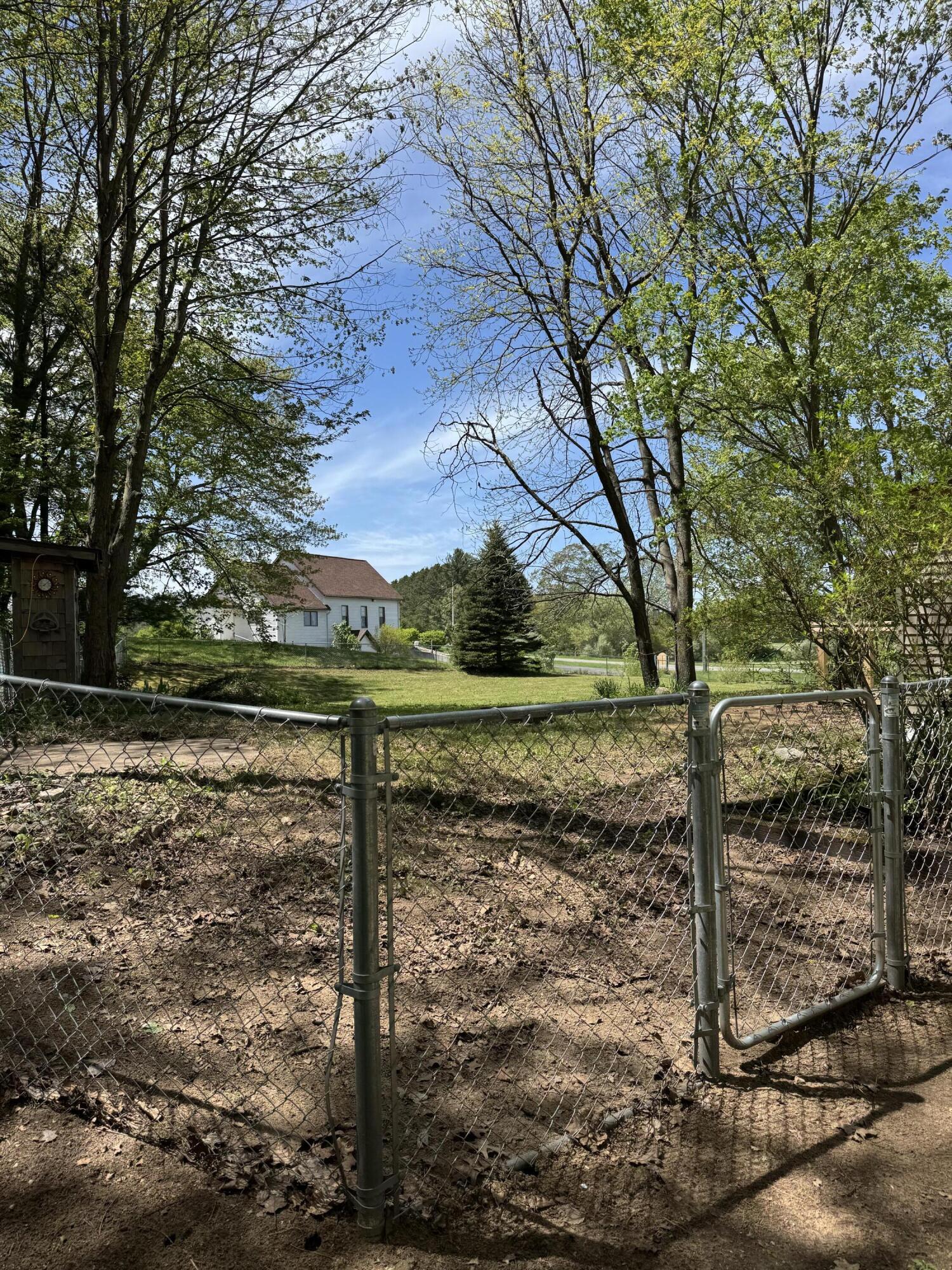 5471 East Free Soil Road Free Soil, MI 49411 - Photo 42 of 46 View from Gate across fenced yard