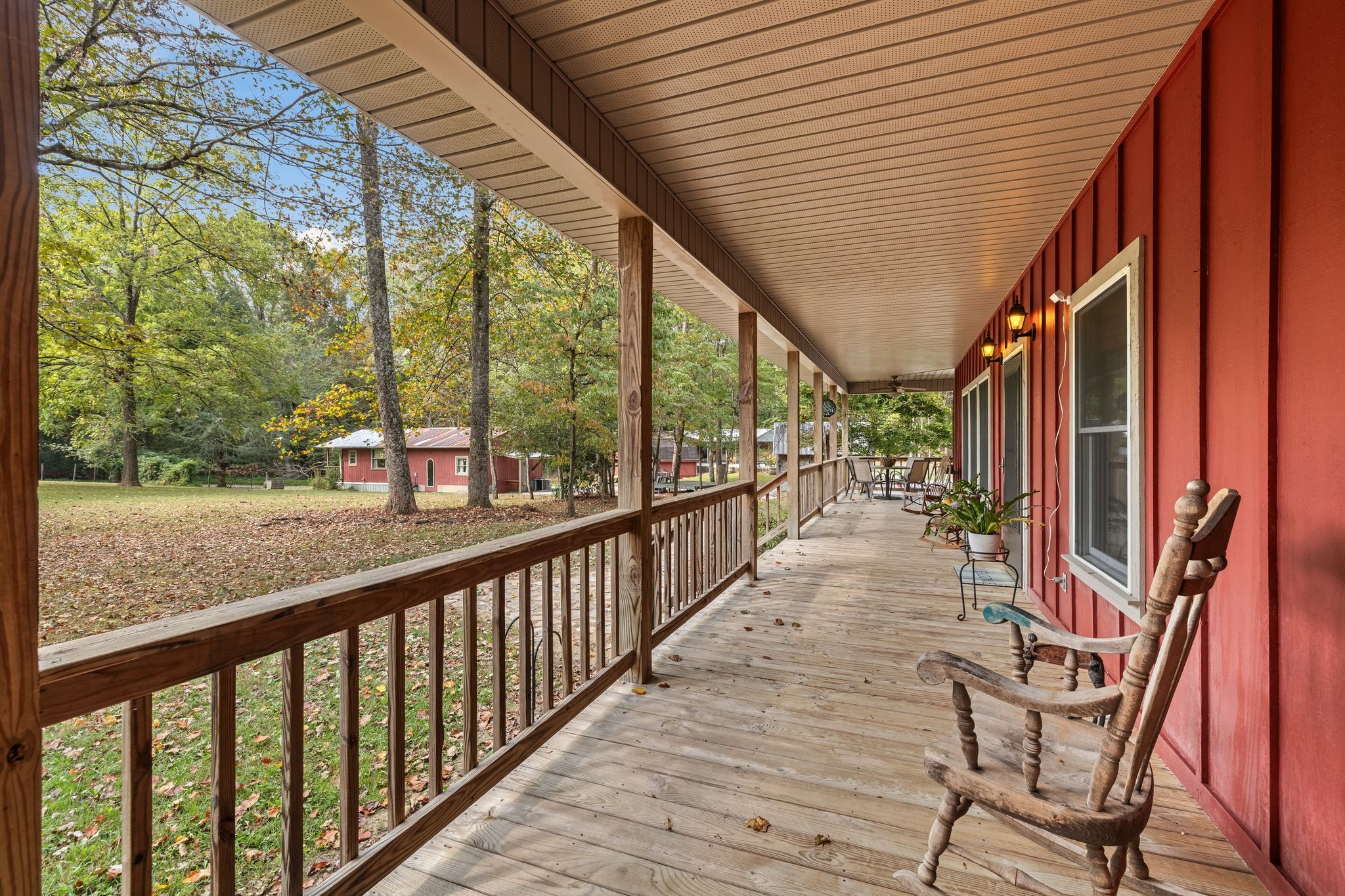 6245 Greentown Road Tracy City, TN 37387 - Photo 11 of 47 a view of a porch with wooden floor and stairs