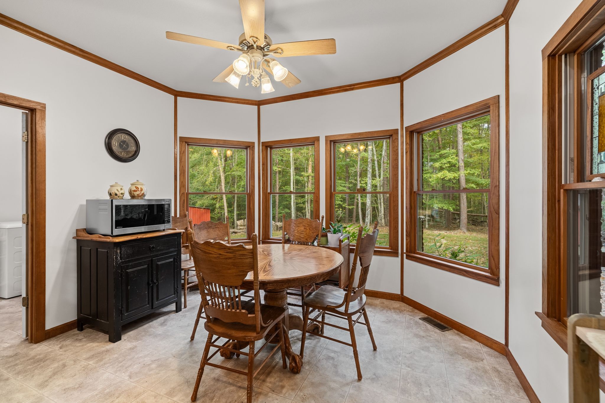 6245 Greentown Road Tracy City, TN 37387 - Photo 25 of 47 a dining room with a large window and table