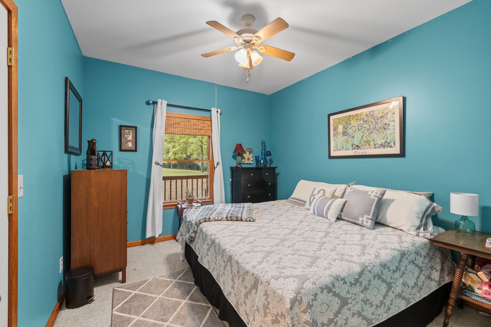6245 Greentown Road Tracy City, TN 37387 - Photo 30 of 47 a bedroom with a bed and a painting on the wall