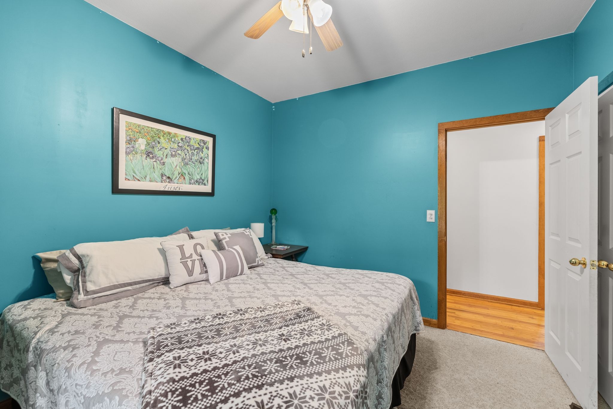 6245 Greentown Road Tracy City, TN 37387 - Photo 31 of 47 a bedroom with a bed and a painting on the wall