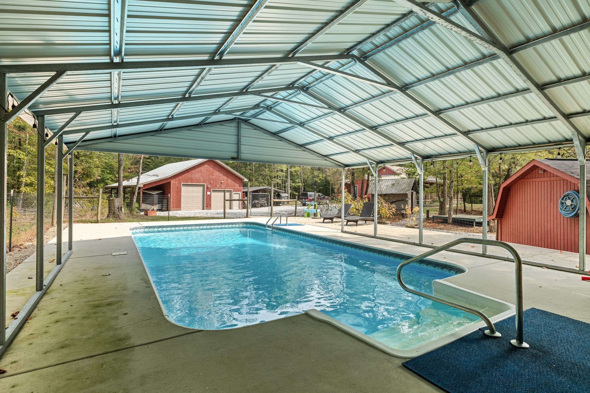6245 Greentown Road Tracy City, TN 37387 - Photo 35 of 47 a view of a swimming pool with a patio