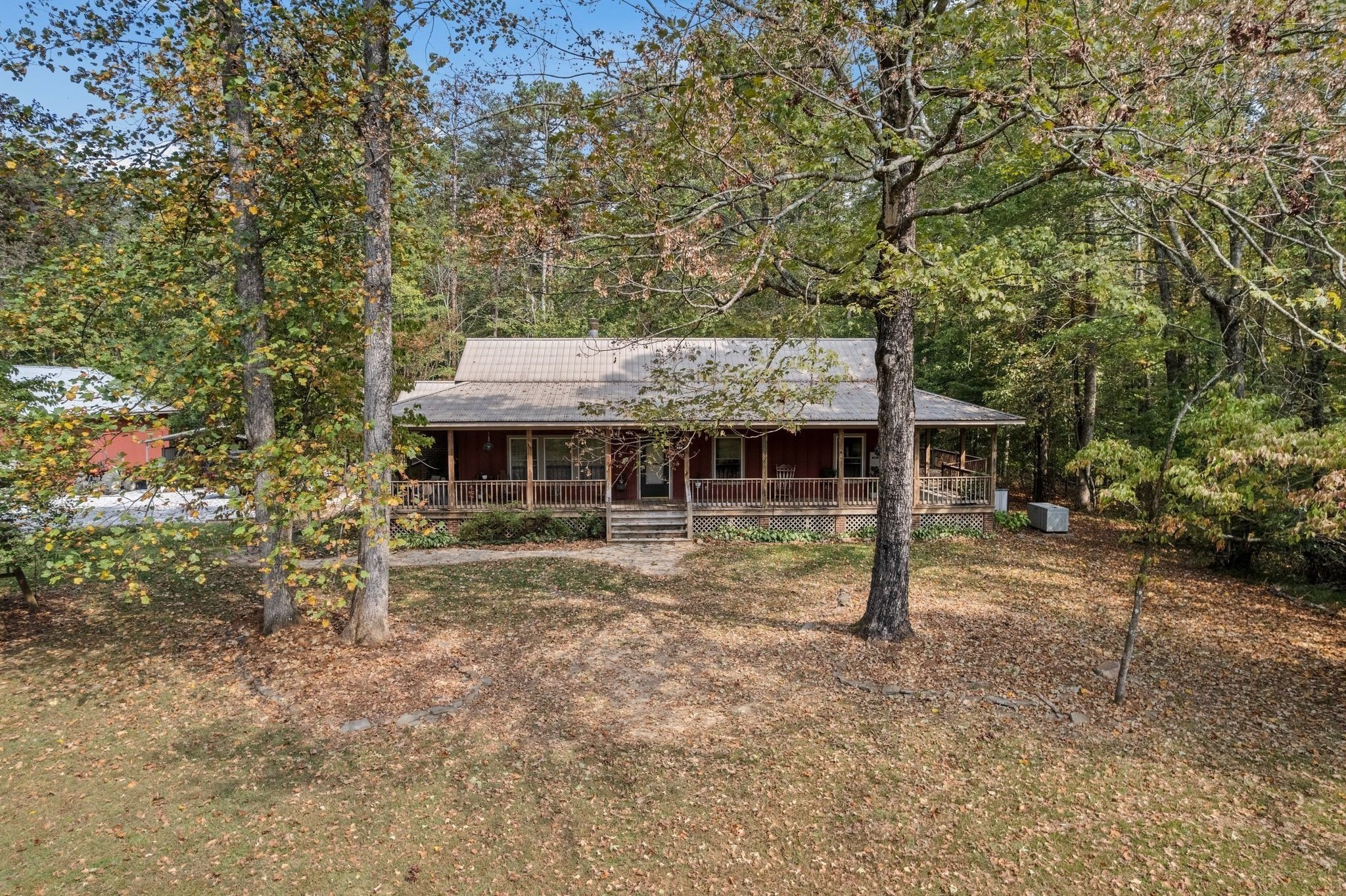 6245 Greentown Road Tracy City, TN 37387 - Photo 4 of 47 a view of a house with a yard balcony and wooden fence