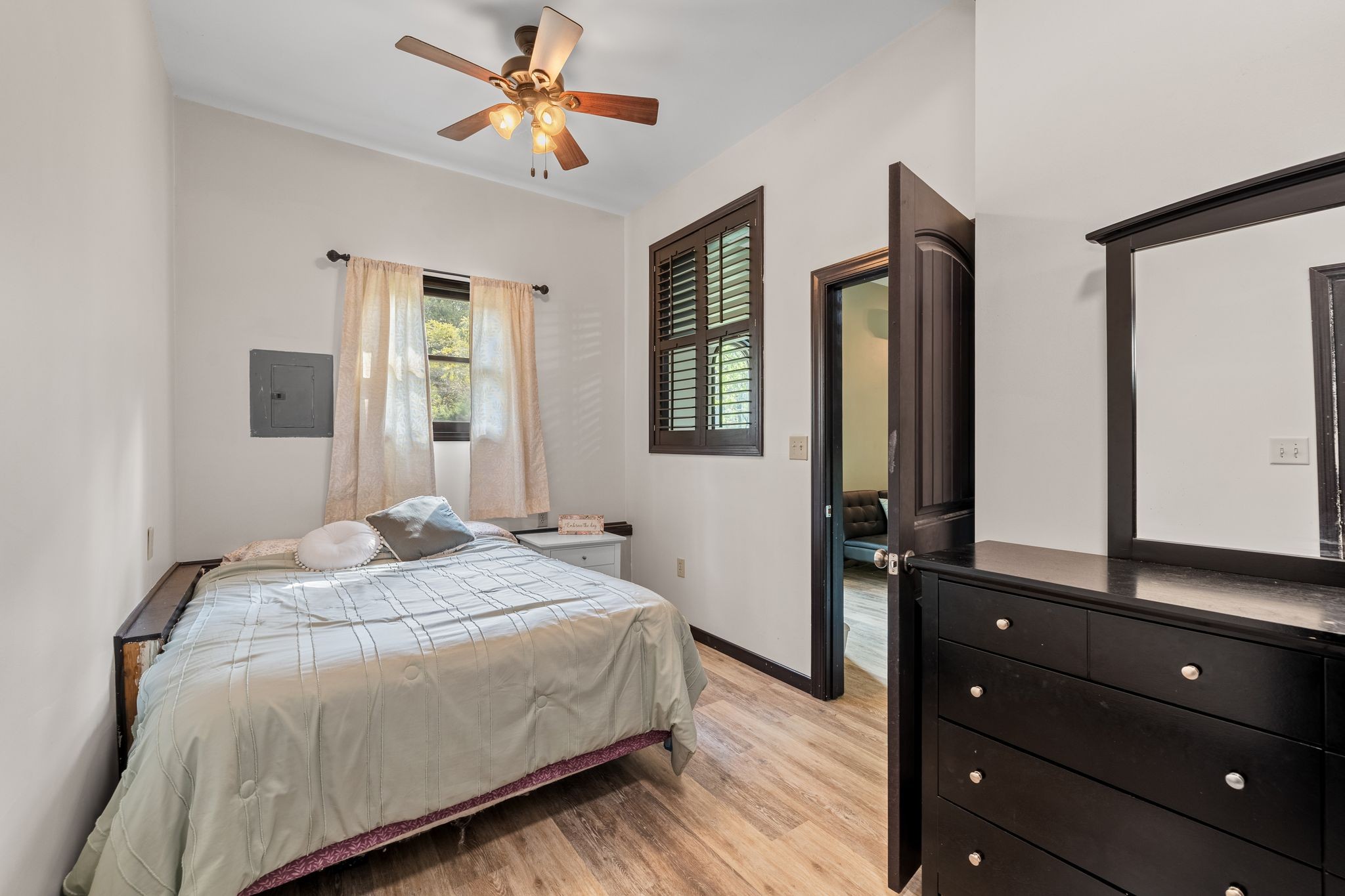 6245 Greentown Road Tracy City, TN 37387 - Photo 43 of 47 a bedroom with a bed and a mirror on the dresser