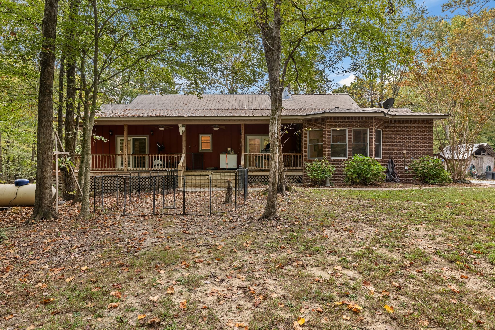 6245 Greentown Road Tracy City, TN 37387 - Photo 9 of 47 a house view with a sitting space and garden