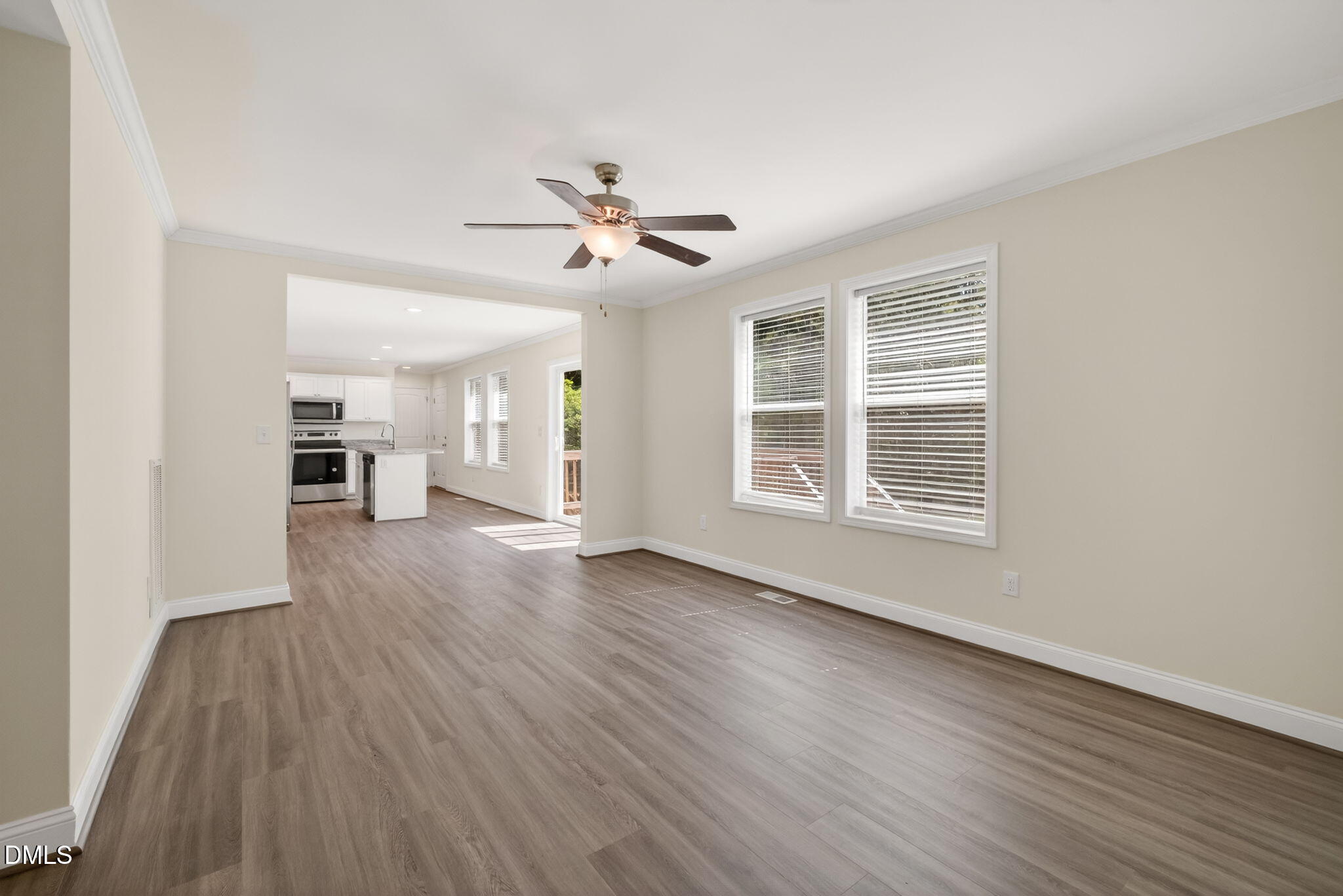 7122 Guess Road Hillsborough, NC 27278 - Photo 34 of 48 a view of empty room with wooden floor and ceiling fan