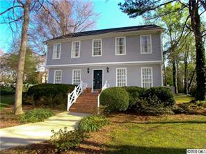 905 Concord Road Davidson, NC 28036 - Photo 2 of 15 a front view of a house with a yard