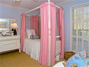 905 Concord Road Davidson, NC 28036 - Photo 13 of 15 a bedroom with a bed and a window