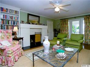 905 Concord Road Davidson, NC 28036 - Photo 5 of 15 a living room with furniture and a fireplace