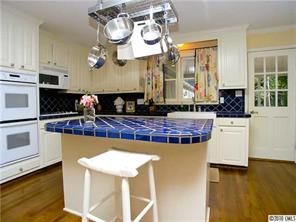 905 Concord Road Davidson, NC 28036 - Photo 7 of 15 a kitchen with a table and chairs in it