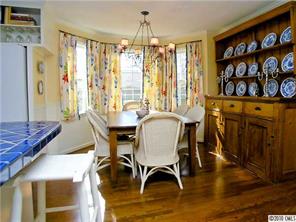905 Concord Road Davidson, NC 28036 - Photo 9 of 15 a view of a dining room with furniture and window
