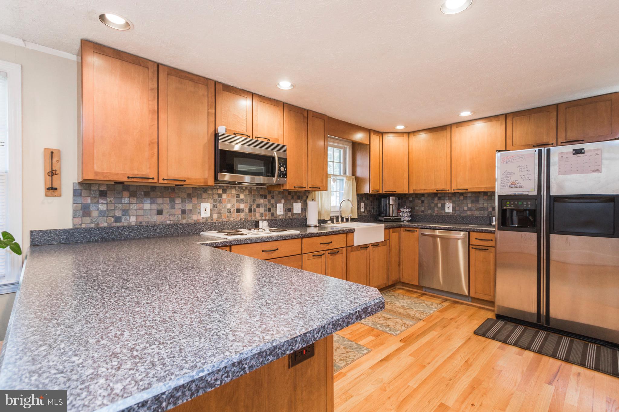 6506 Shamrock Road Manassas, VA 20112 - Photo 23 of 64 completely renovated kitchen with wood floors
