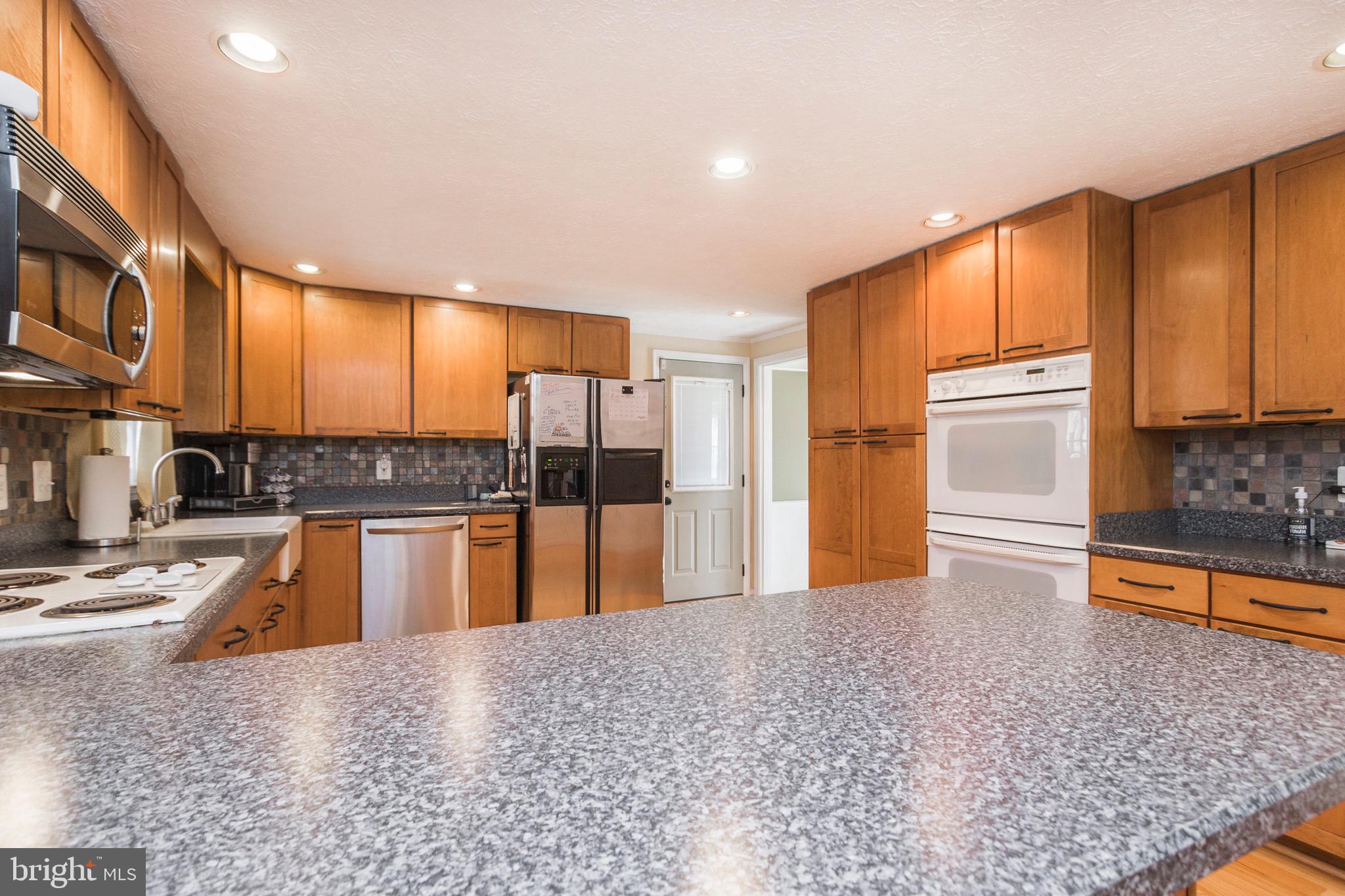 6506 Shamrock Road Manassas, VA 20112 - Photo 25 of 64 completely renovated kitchen with wood floors