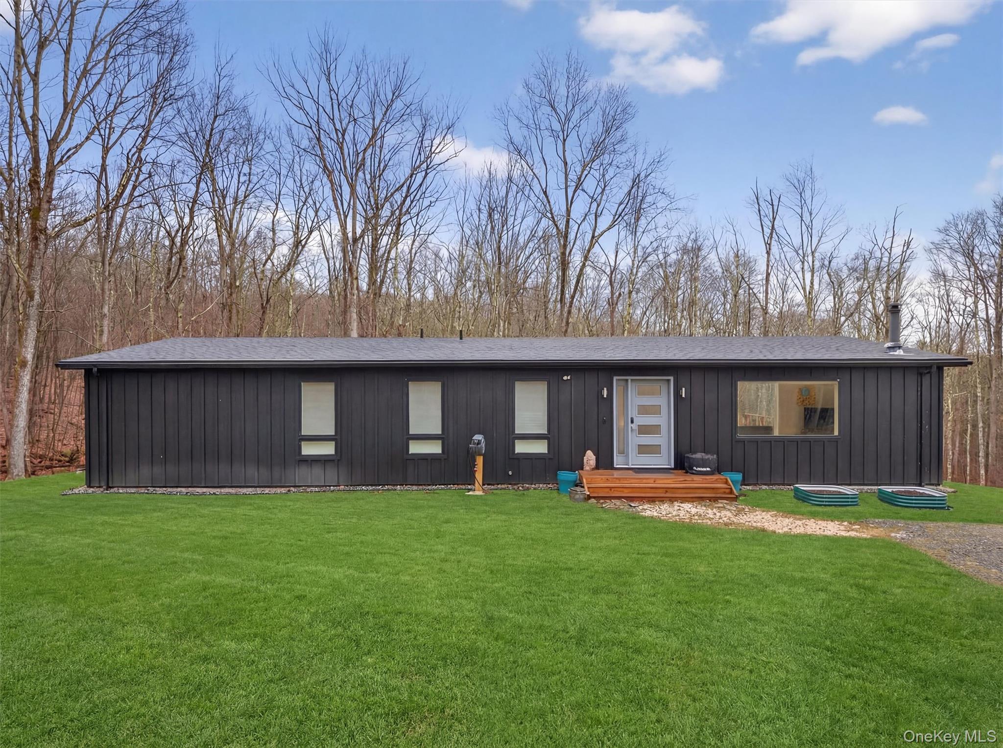 119 Lenni Lenape Road Narrowsburg, NY 12764 - Photo 2 of 40 View of front of home with a front yard