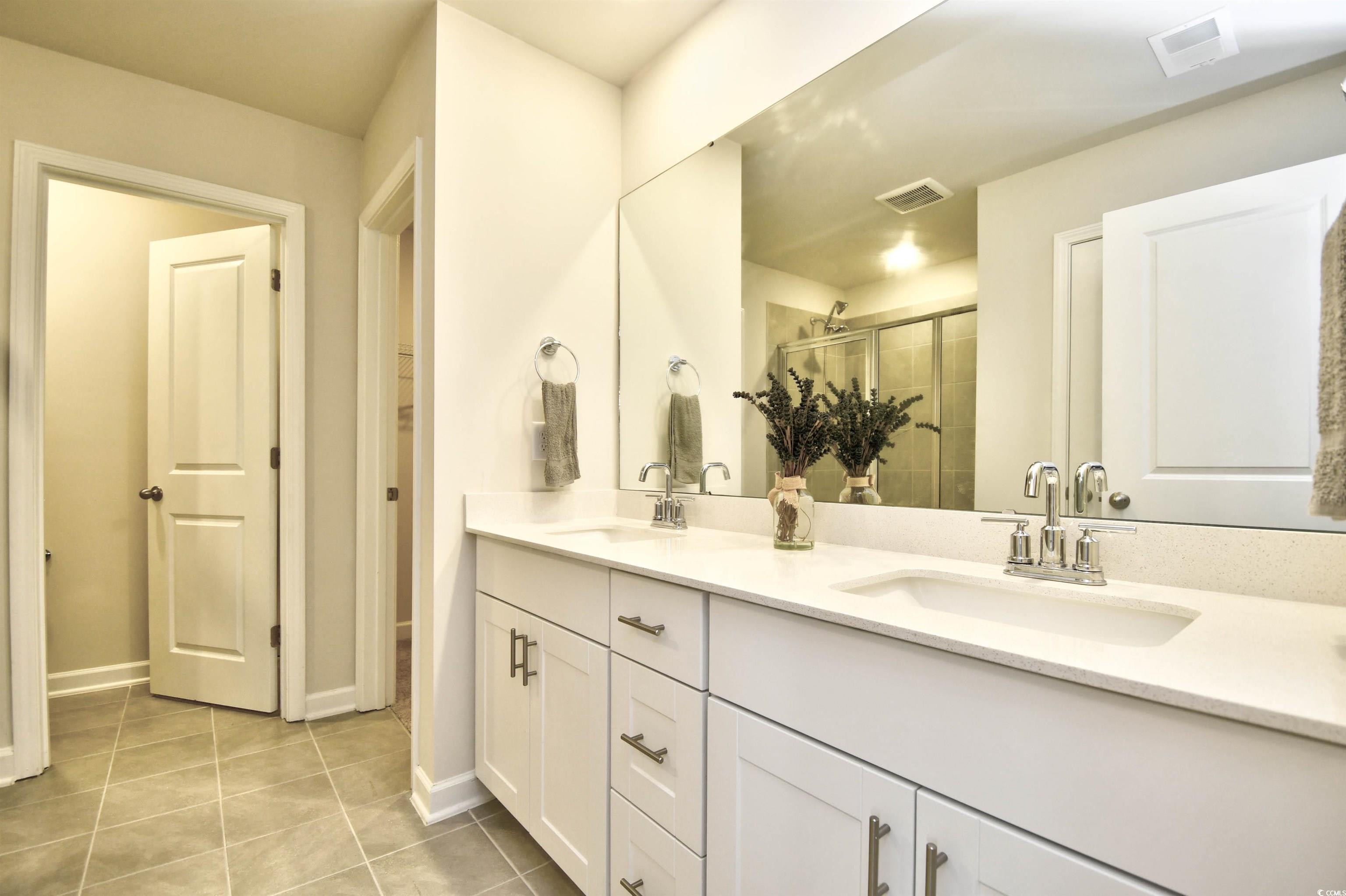 2325 Copper Crk Loop Longs, SC 29568 - Photo 24 of 40 Bathroom featuring a shower stall and light tile patterned floors