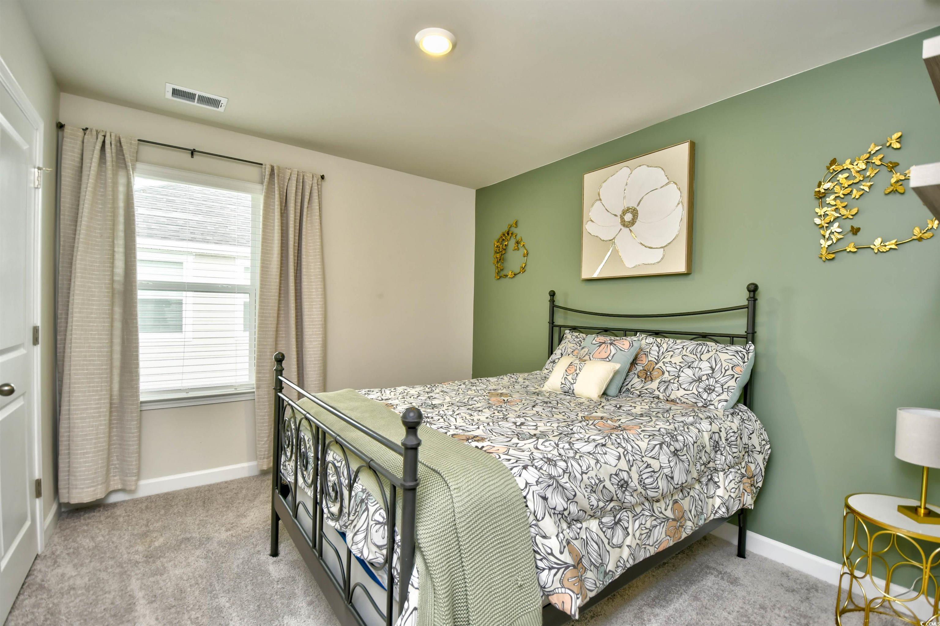 2325 Copper Crk Loop Longs, SC 29568 - Photo 27 of 40 Bedroom featuring light colored carpet and baseboards