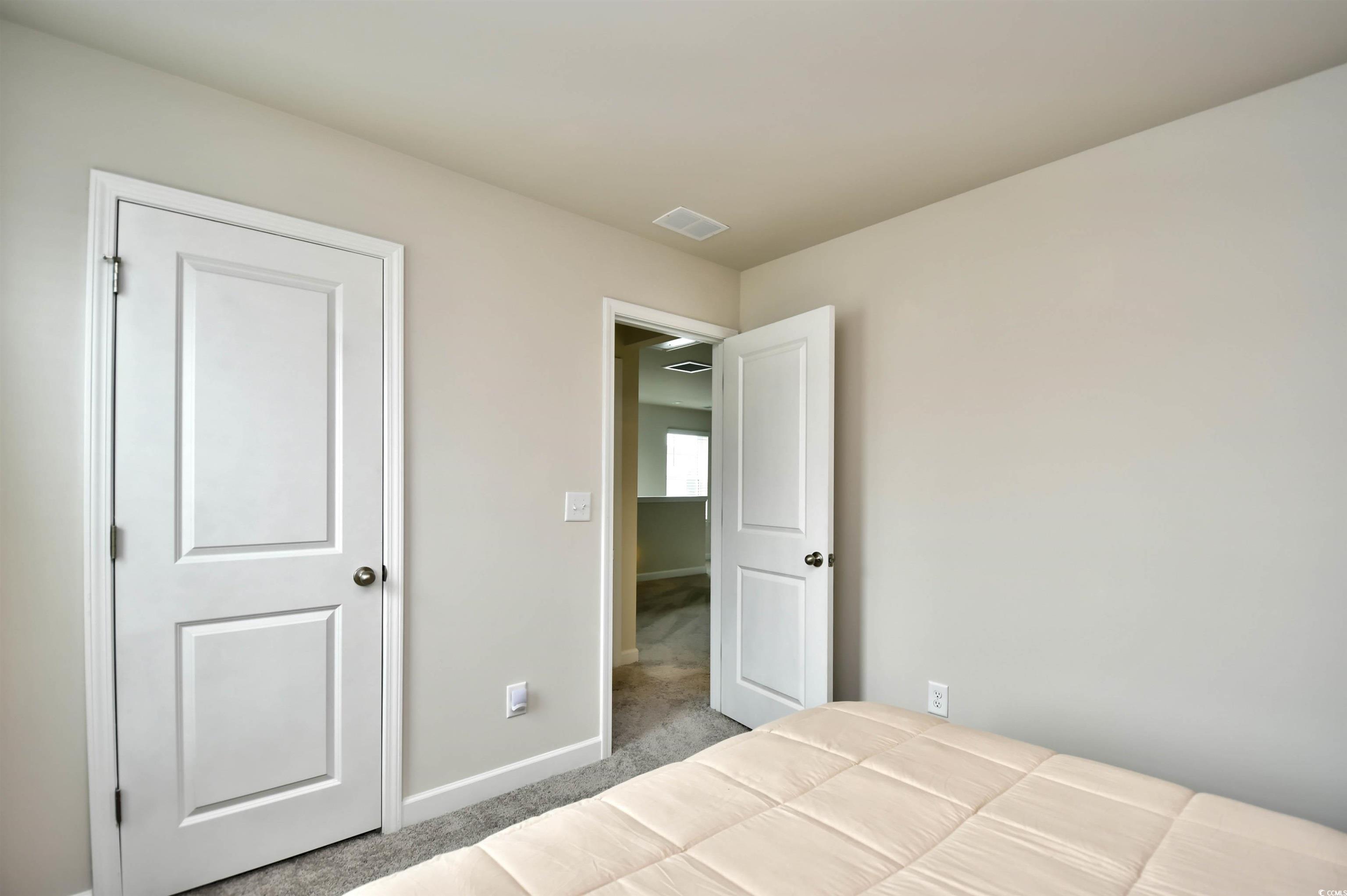 2325 Copper Crk Loop Longs, SC 29568 - Photo 30 of 40 Unfurnished bedroom with carpet and baseboards