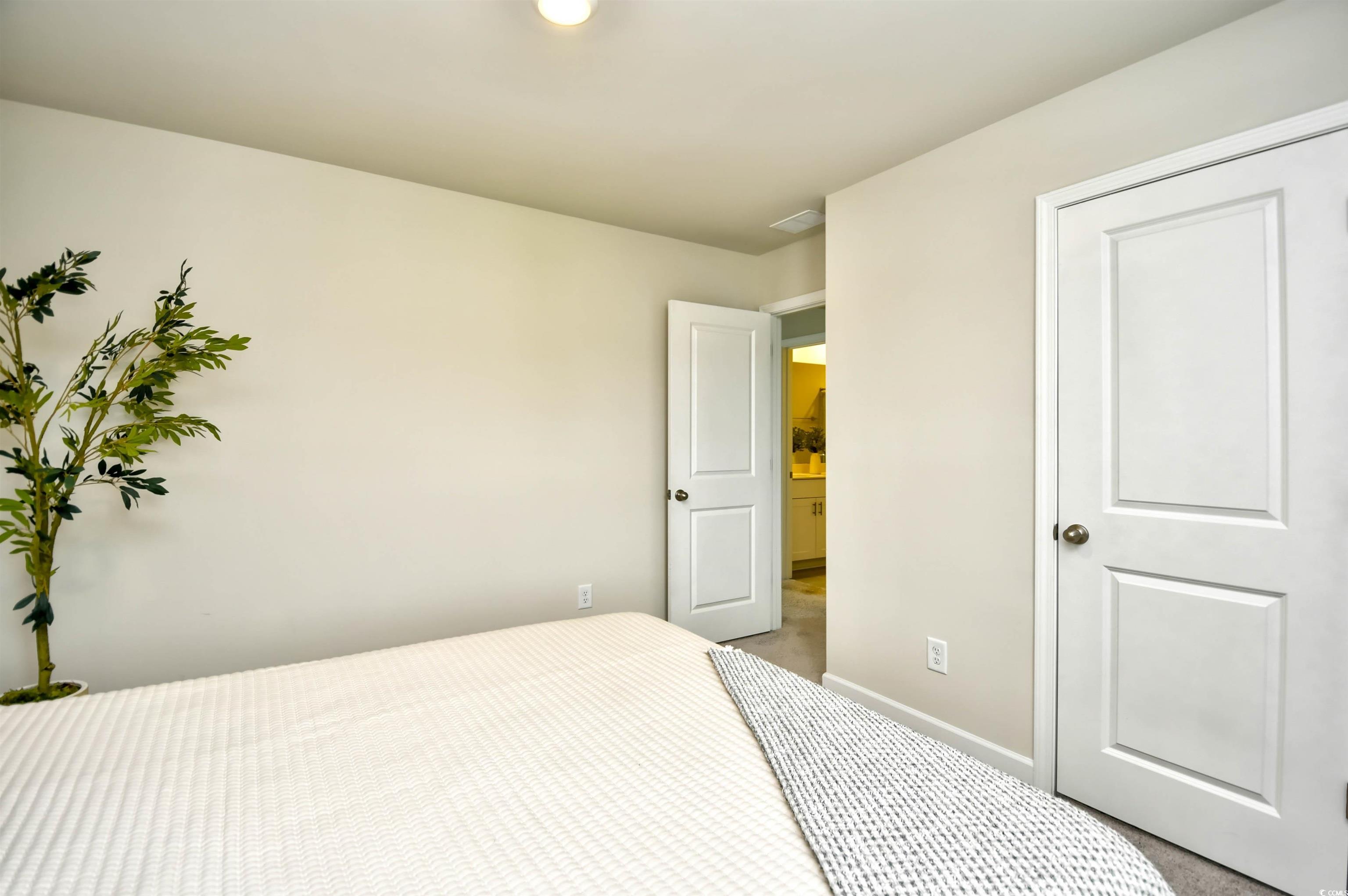 2325 Copper Crk Loop Longs, SC 29568 - Photo 32 of 40 Carpeted bedroom with baseboards