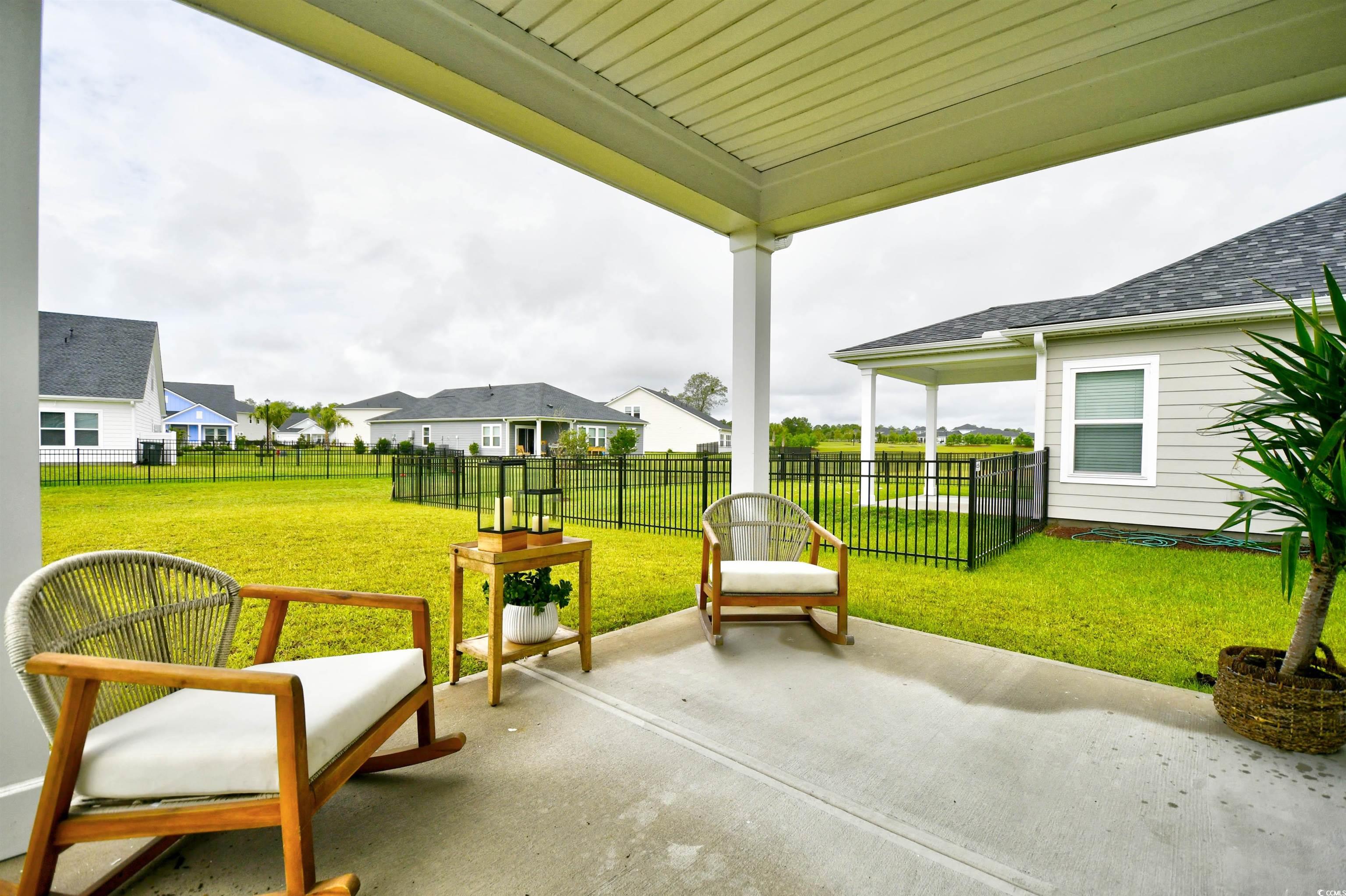 2325 Copper Crk Loop Longs, SC 29568 - Photo 34 of 40 View of patio with a residential view