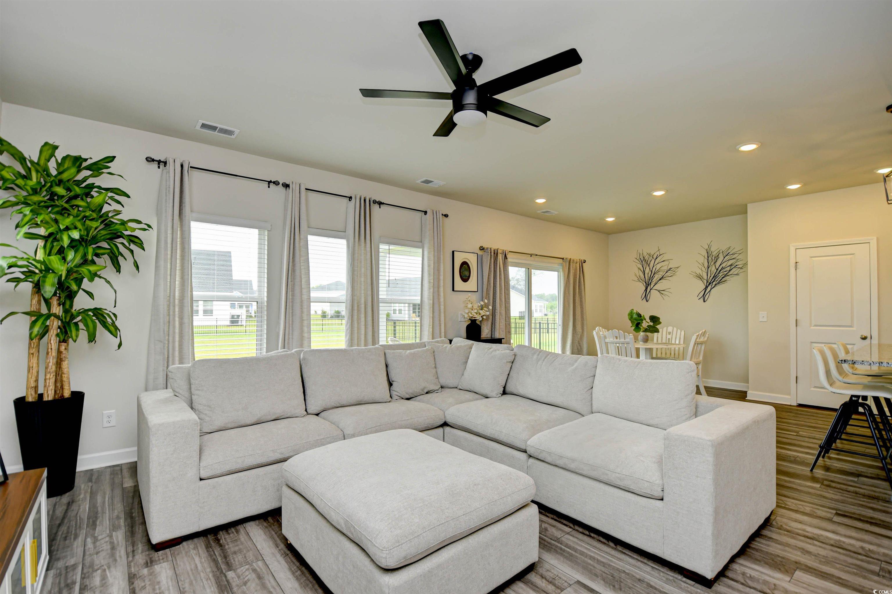2325 Copper Crk Loop Longs, SC 29568 - Photo 6 of 40 Living room with recessed lighting, ceiling fan, and wood finished floors