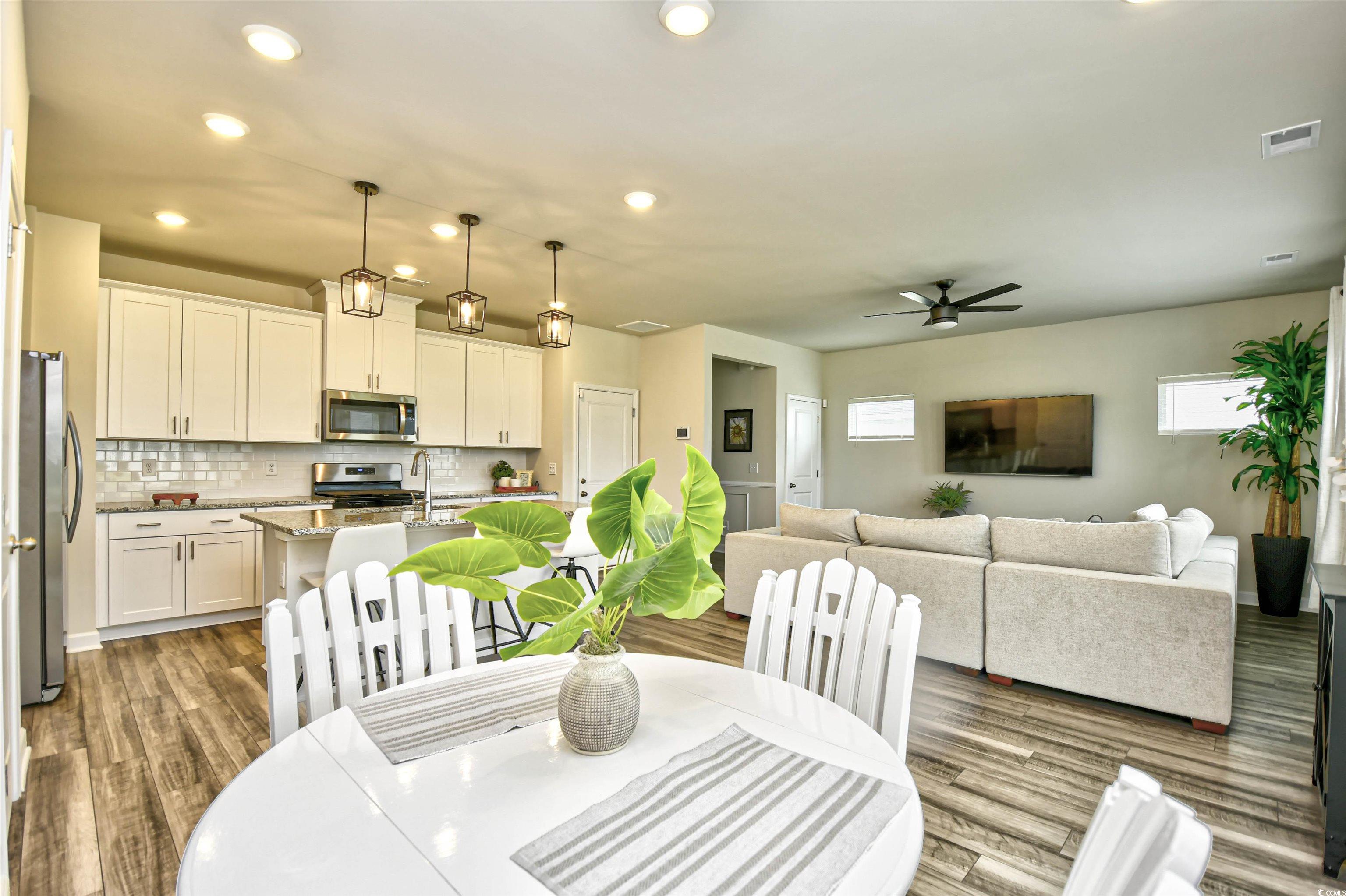 2325 Copper Crk Loop Longs, SC 29568 - Photo 10 of 40 Dining room featuring recessed lighting, dark wood-type flooring, and ceiling fan