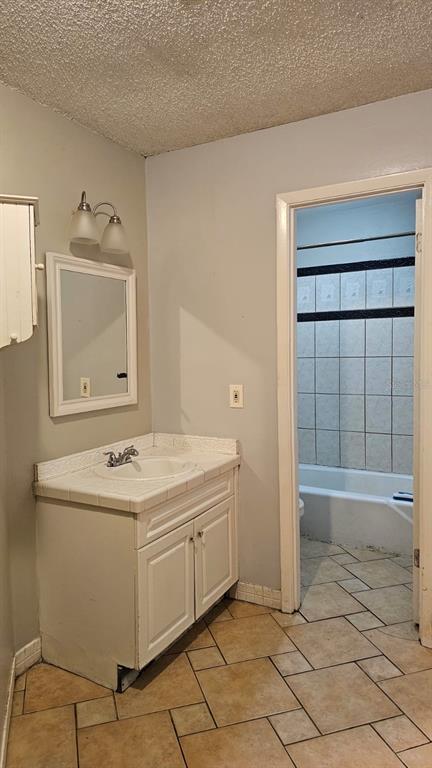 2514 Lemon Tree Lane, Unit I Orlando, FL 32839 - Photo 7 of 10 a bathroom with a sink toilet and tub