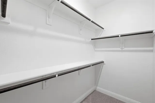 a bathroom with a sink toilet and vanity