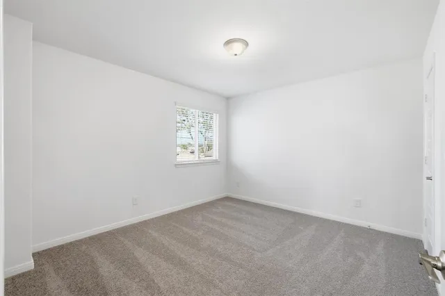 a bathroom with a sink and shower