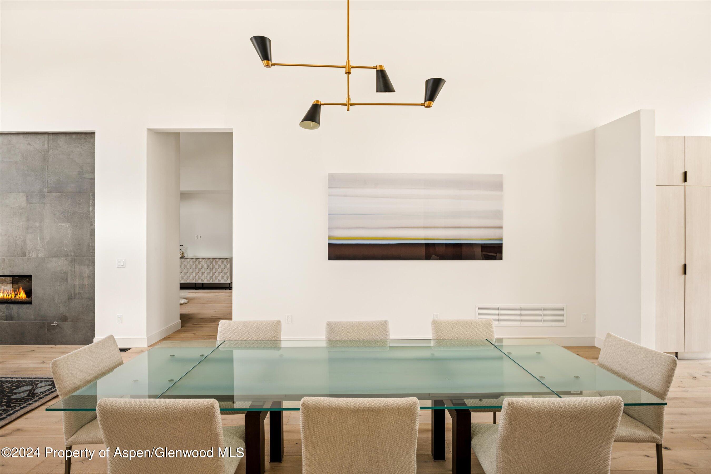 505 Diamond A Ranch Road Carbondale, CO 81623 - Photo 12 of 33 a view of kitchen island with furniture and wooden floor