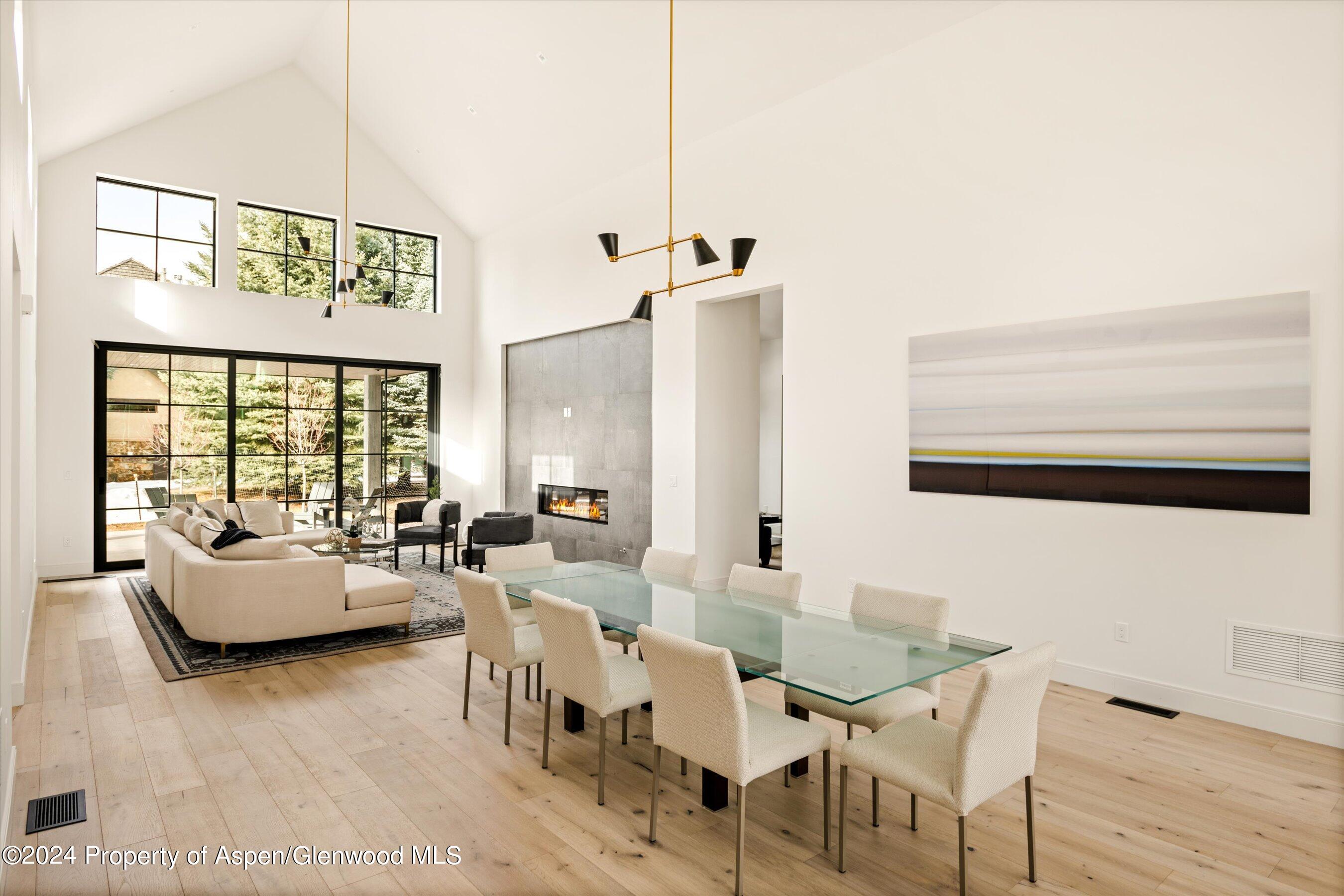 505 Diamond A Ranch Road Carbondale, CO 81623 - Photo 13 of 33 a view of a livingroom with furniture and floor to ceiling window