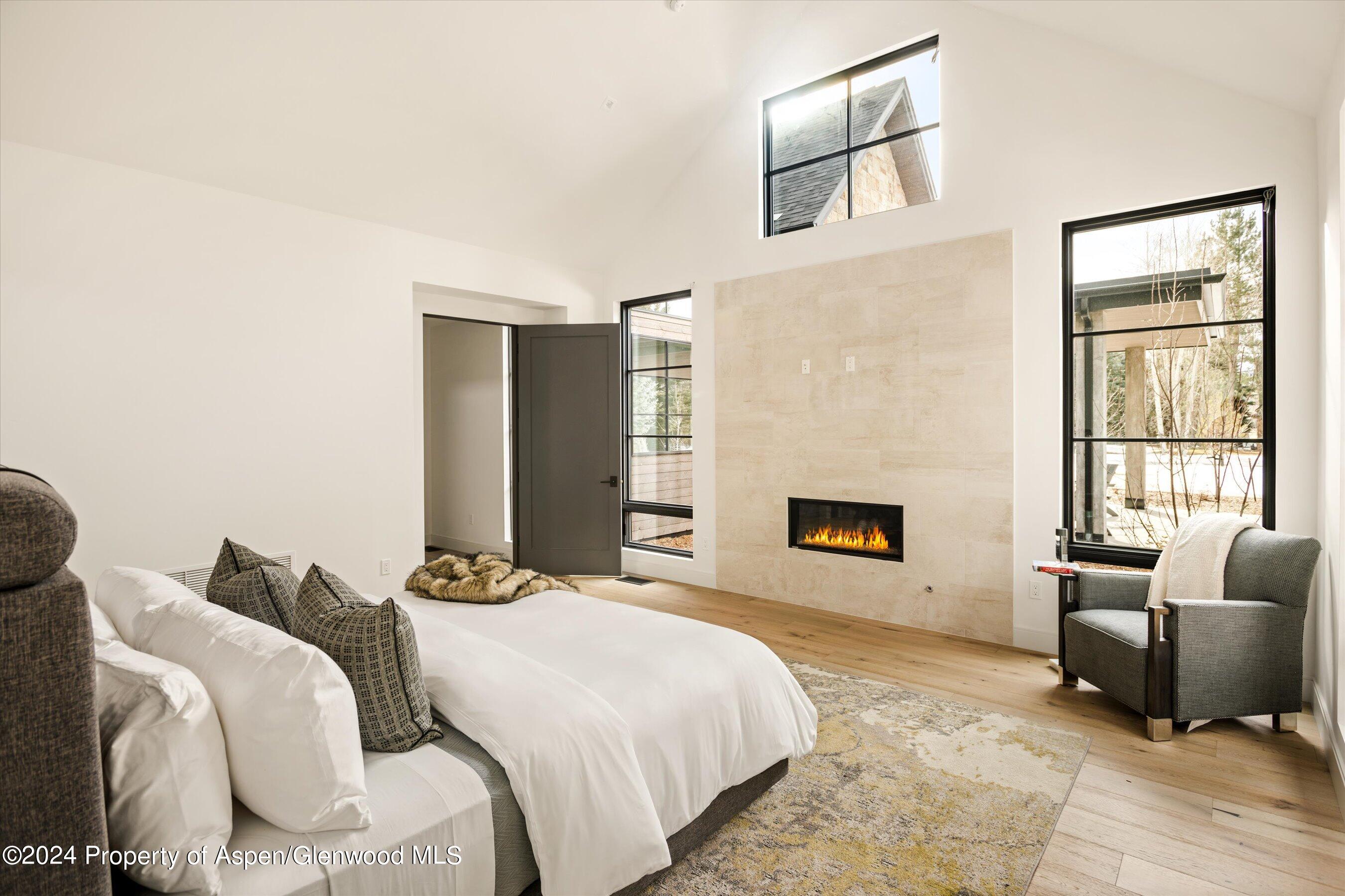 505 Diamond A Ranch Road Carbondale, CO 81623 - Photo 17 of 33 a bedroom with a bed and a couch