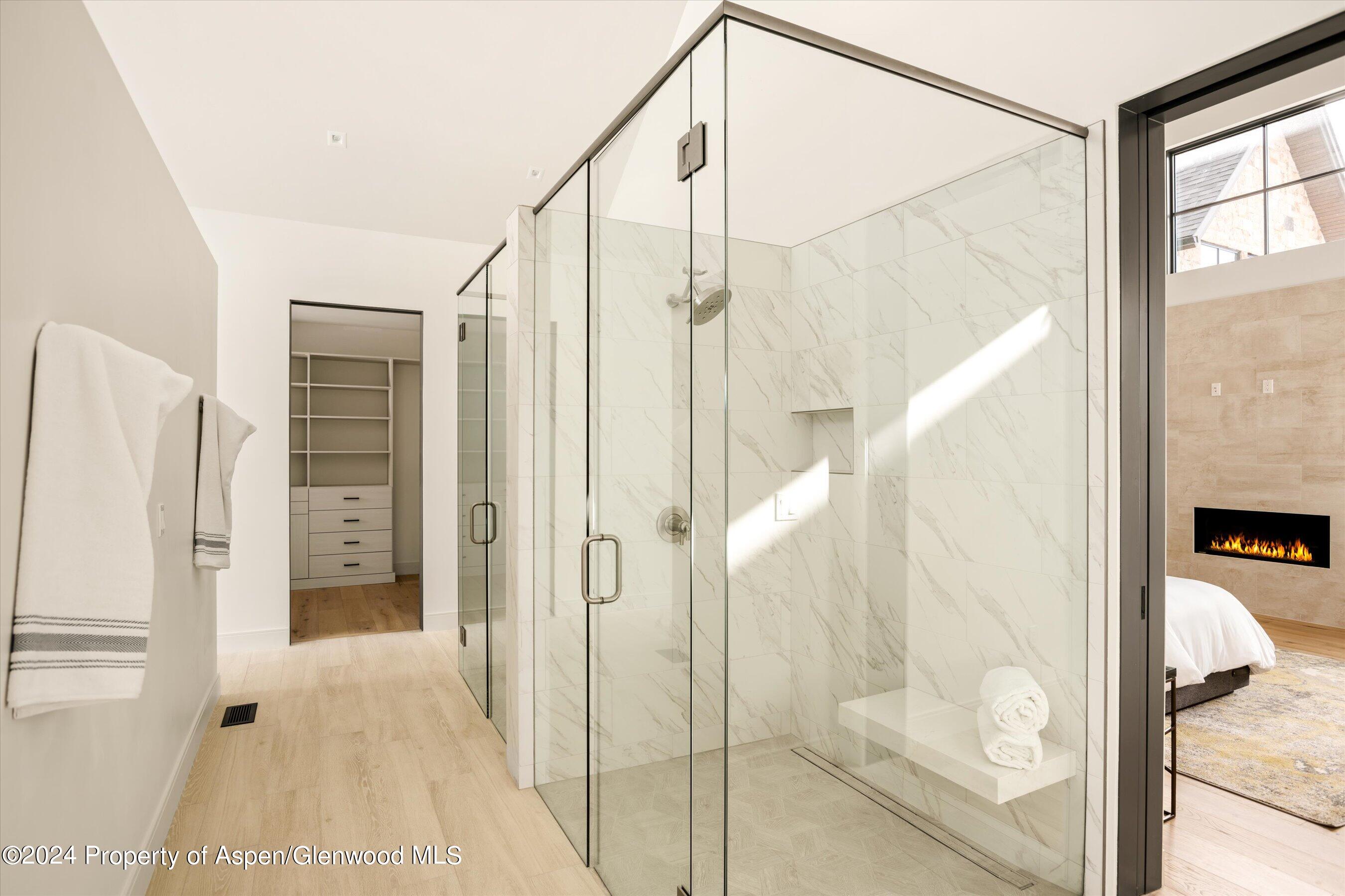 505 Diamond A Ranch Road Carbondale, CO 81623 - Photo 20 of 33 a bathroom with a glass door shower and a sink
