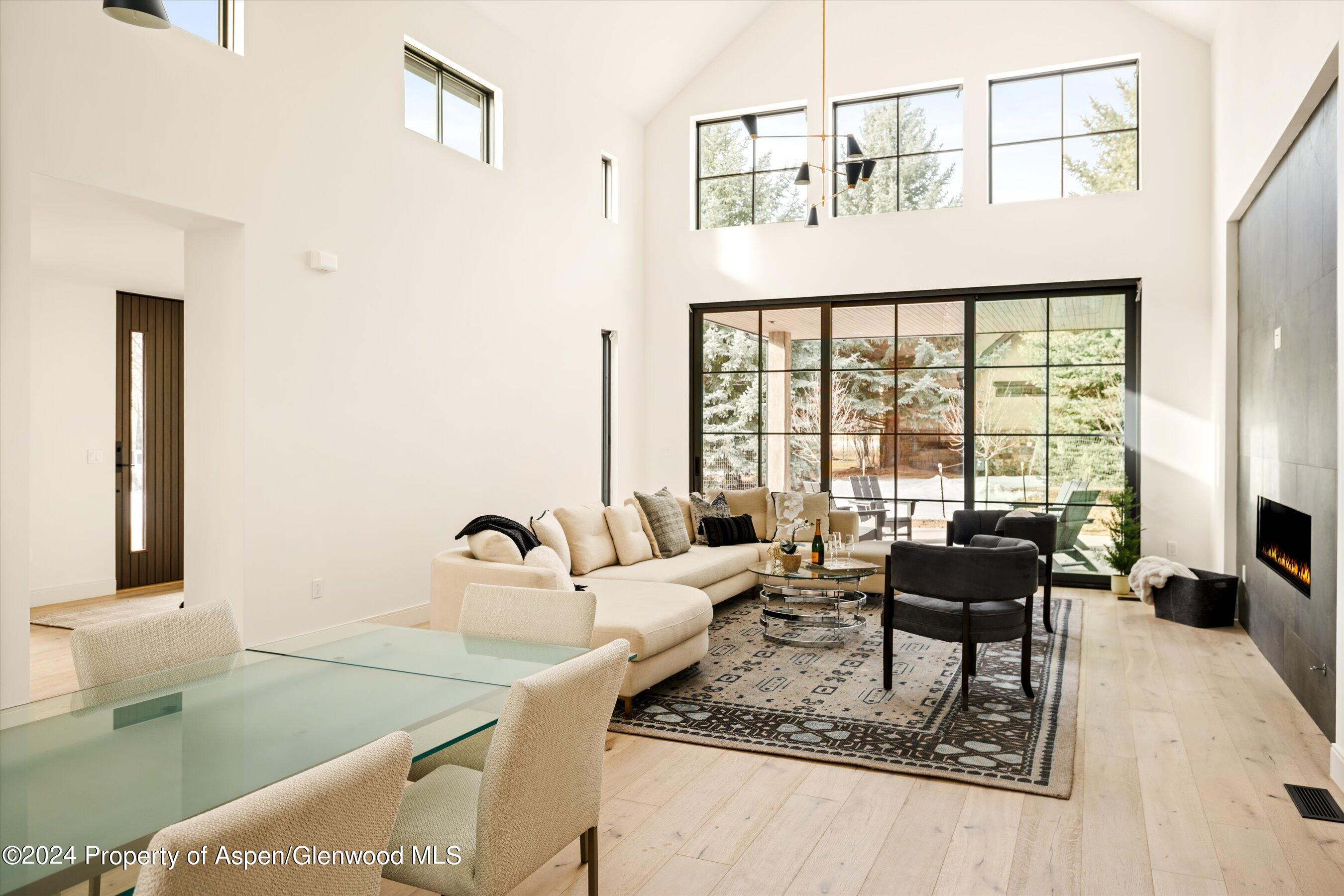 505 Diamond A Ranch Road Carbondale, CO 81623 - Photo 10 of 33 a living room with furniture and large windows
