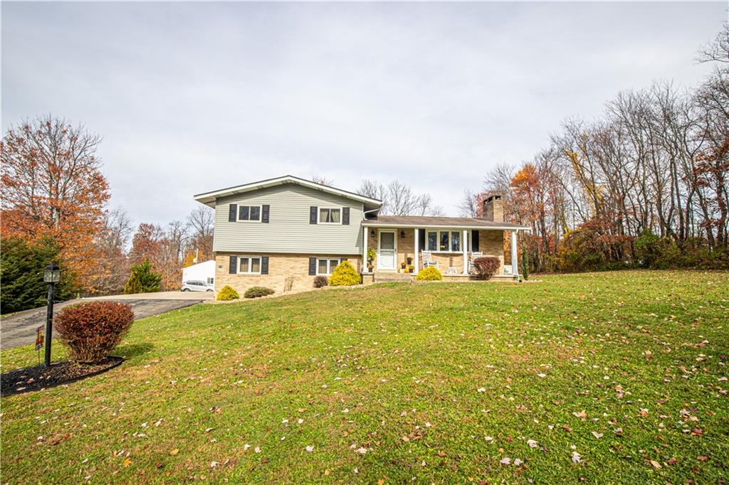 178 Kaider Road Uniontown, PA 15401 - Photo 1 of 17 a house view with a garden space